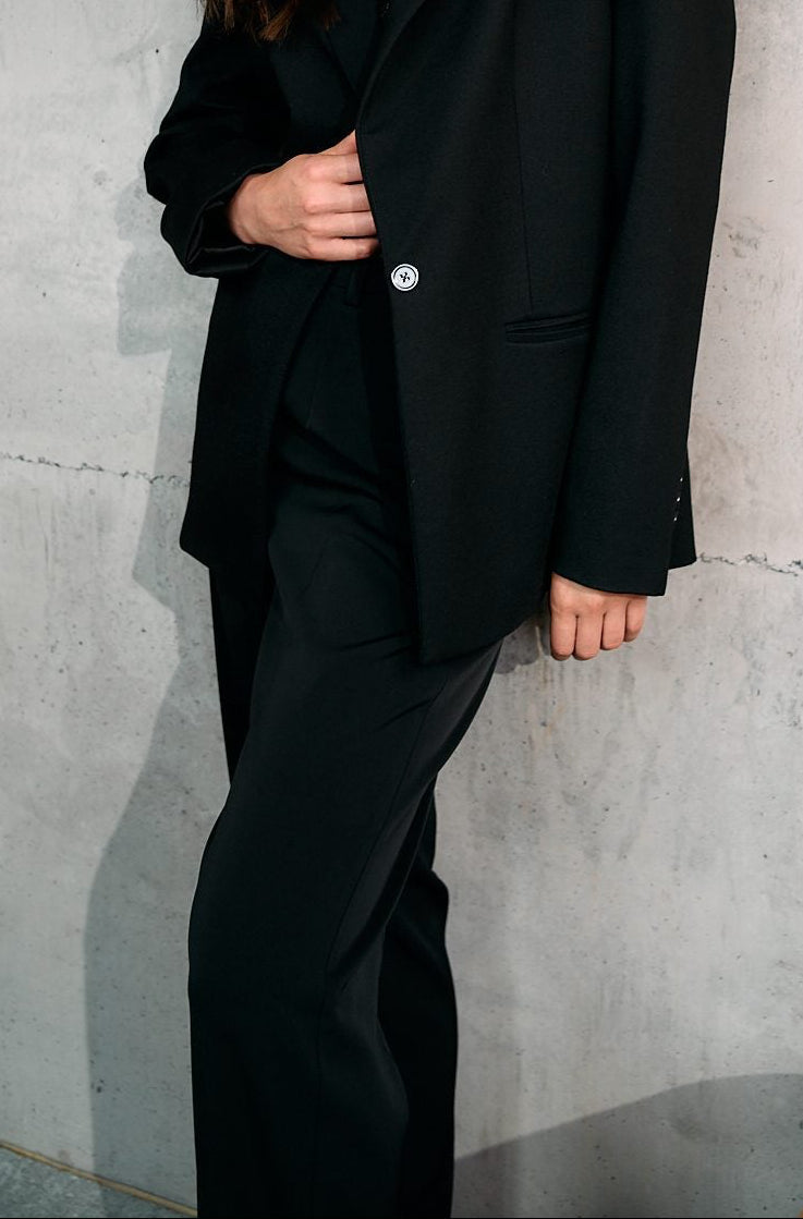 BOLDNSUBTLE oversized black blazer, made in Portugal, worn open over black trousers