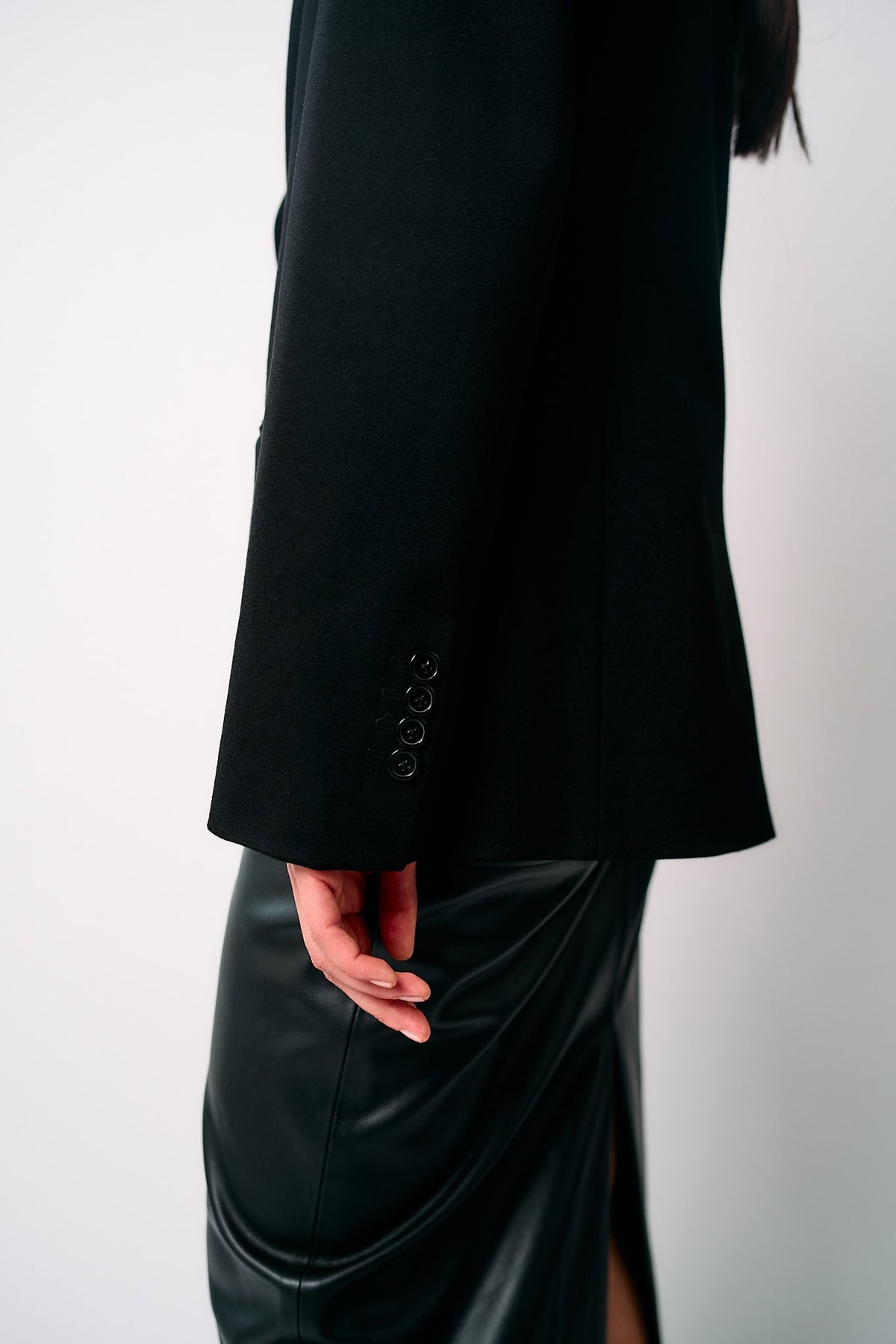 Close up of the BOLDNSUBTLE oversized black blazer fabric
